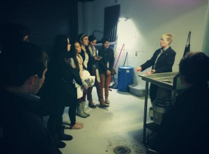 Lori Pratt gives local high-school students a lesson about grinding food waste into energy. PHOTO: Grind2Energy