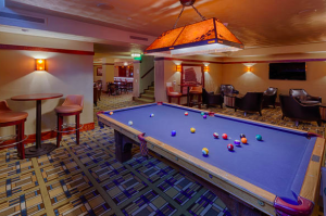 A billiards room appeared on Wright’s original drawings. Although the billiards table is not original to the hotel, it is from the period in which the hotel was built. PHOTO: Aaron Thomas