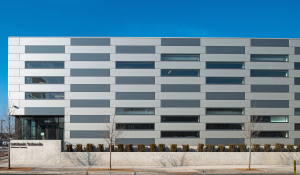 The public charter school building showcases a distinctive, patterned facade with multiple components finished in Valspar’s Fluropon 70 percent polyvinylidene fluoride (PVDF) resin-based exterior coatings.