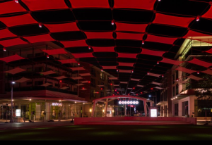 The unique and colorful “mandolin” shade structure was part of a several million dollar landscaping renovation covering approximately 10,000 square feet of the mall’s common area.
