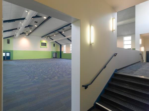 The interior of the renovated building was designed to be flexible with smaller spaces at the rear utilized for temporary classrooms and the large assembly space for more active group uses. 