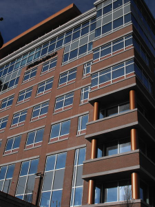  To address noise from a nearby elevated interstate and multi-modal facility where light rail, passenger and freight railways converge, SunGuard SNR 43 triple-glazed units were used for the office space on the upper four floors and for the hotel’s lower floors.