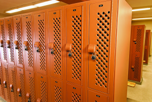Charles Logan, director of the Jamail Texas Swim Center, specified the color Spice for the two-tiered Lenox Lockers to reinforce the room’s new burnt-orange color scheme (the school colors are burnt orange and white). 