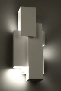 The Escher LED wall sconce has a low profile design that enables the luminaire to mount vertically or horizontally.