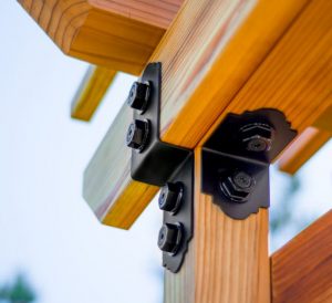 The line of connectors and fasteners provides design and structural strength to custom outdoor living structures.