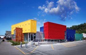 PAC-CLAD corrugated metal installed in five different colors sets itself apart from other construction.