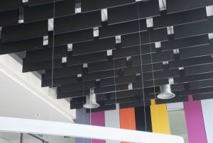 Rockfon expands its selection of acoustic stone wool ceiling products with the addition of Rockfon Multiflex Fibral Baffles Black.