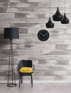 The Tri-wood glazed porcelain tile collection is paired with a color palette of grey or beige.