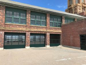 Renovations at the Riis Park Bathhouse called for elements of flow-through design, including roll-up doors, to make the historic property more resilient to future storms.