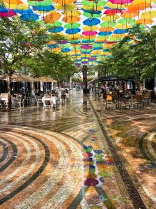 During the summer, the streetscape hosted an art installation by the Umbrella Sky Project. 