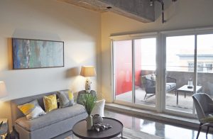 Each one-bedroom apartment, which ranges in size from 650 to 670 square feet, features polished concrete floors and concrete walls.
