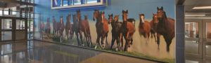 Mural showcases the pride of being a Travis Science Academy Mustang.