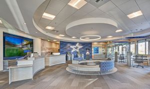 Rockfon Artic acoustic stone wool ceiling panels and Chicago Metallic suspension systems accomplish the aesthetic and functional needs of the project.