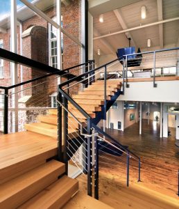 Salvaged materials were reused throughout the project. Of note is a new monumental steel STAIR, utilizing 200-year-old beams as treads and platforms.