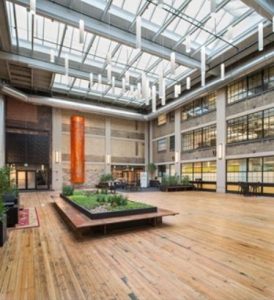 The mixed-use live/work/play development utilizes a VELUX Venting Modular Skylights (VMS) system for both natural light and passive ventilation.